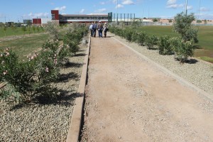 Walkway between stadium and training building, which is west of stadium.